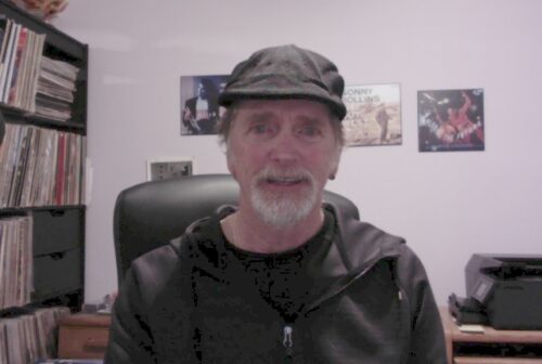 An image taken of Eric Tompkins, taken in his home office.