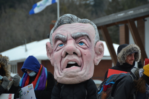 One protestor had a large 3D caricature of Premier Francois Legault's head, with a scowling face.