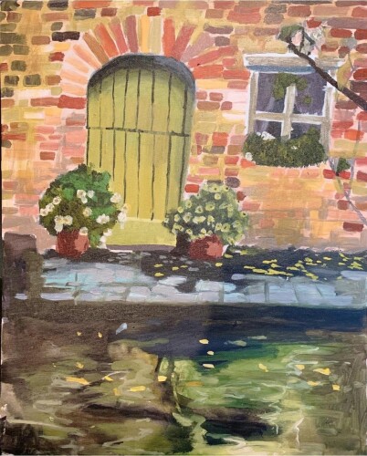 A photo of one of Tran's paintings. It shows a green wooden door in a brick house with plants surrounding the door.