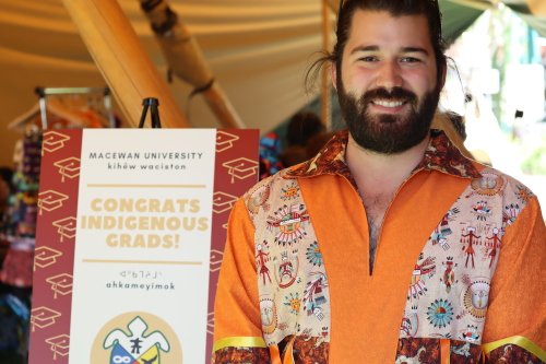 Image shows Dalyn Boyd, graduate attending the Indigenous Artisan Market