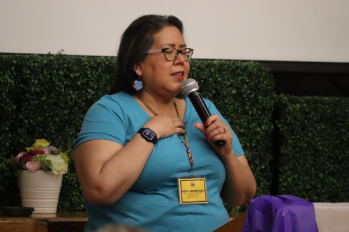 Image shows Cheryl WhiskeyJack speaking at Bent Arrow Culture Camp