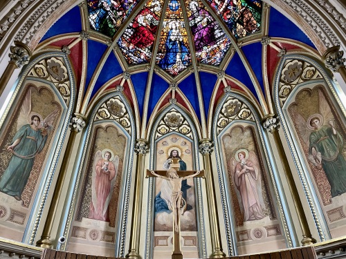 The restored, multicoloured murals in the basilica.