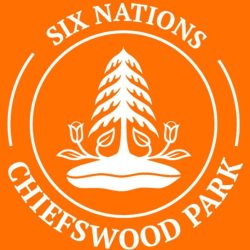 Orange background white text in a circle saying "Six Nations, Chiefswood Park " inside the circle is a white drawing of an evergreen tree