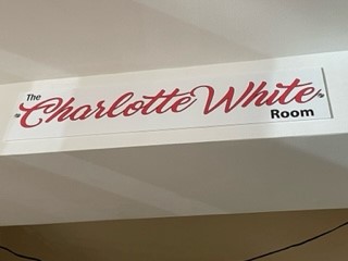 Charlotte White Room sign on display