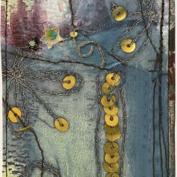 A multi-media card using fabric, metal, paint and string is featured.