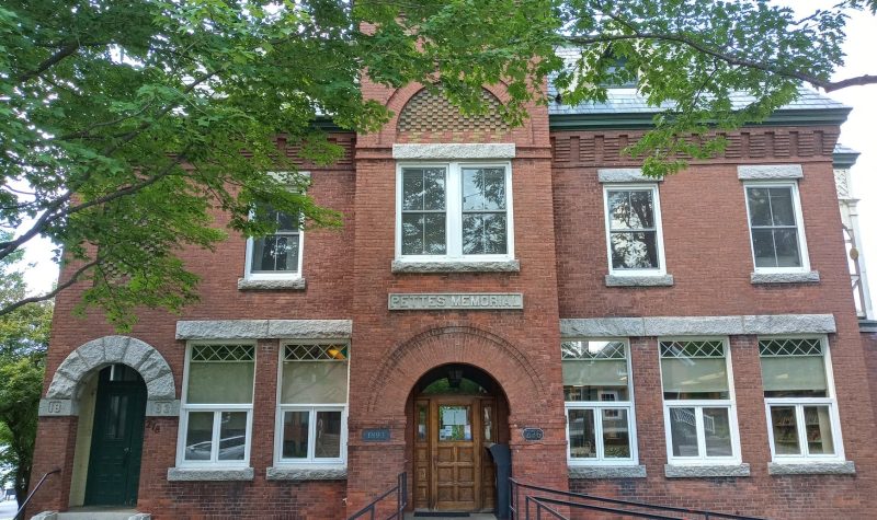 Pictured is the front of the Pettes Memorial Library. It is an old brick building that dates back