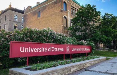 The exterior of a University Ottawa building and sign.