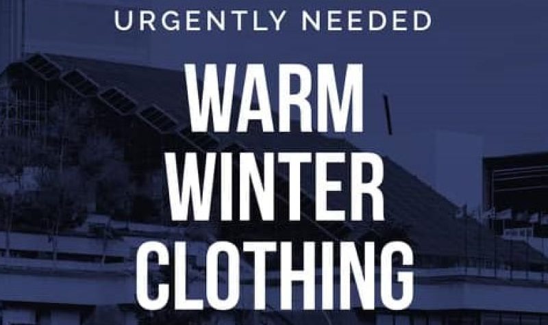 Poster on blue background that reads Urgently Needed, Warm winter clothing.