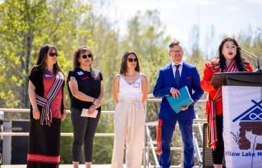 Image show dignitaries speaking at celebration event in Willow Lake Métis Nation