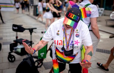 A woman wearing a pride hat at the TD Block Party that took place on Thursday.