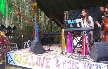 A vocalist and a stand up bassist perform on the Lovefest stage.