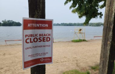 A sign at Beavermead beach indicating that the beach is closed.