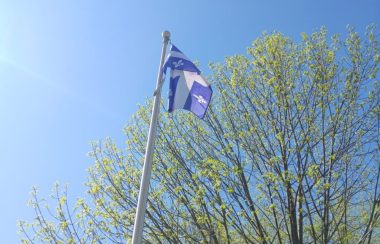 Pictured is a photo of Quebec's flag.