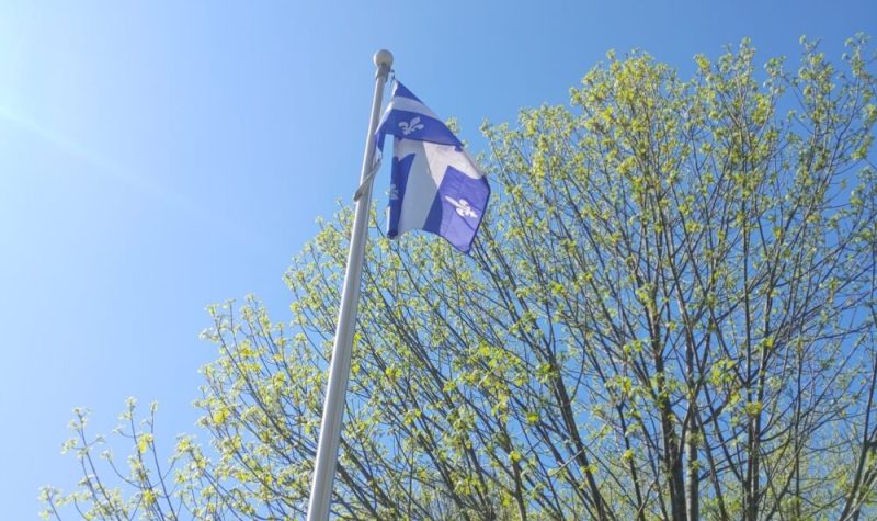 Pictured is a photo of Quebec's flag.