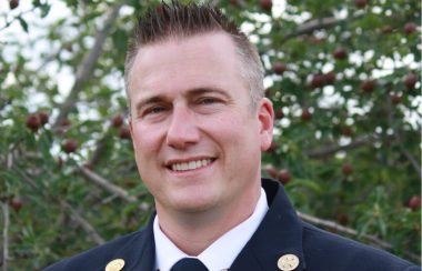 A headshot photo of New Abbotsford Fire Chief Erik Peterson