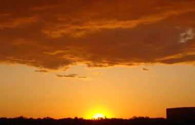 A picture of a yellow and orange sunset in a stock image by Flickr.