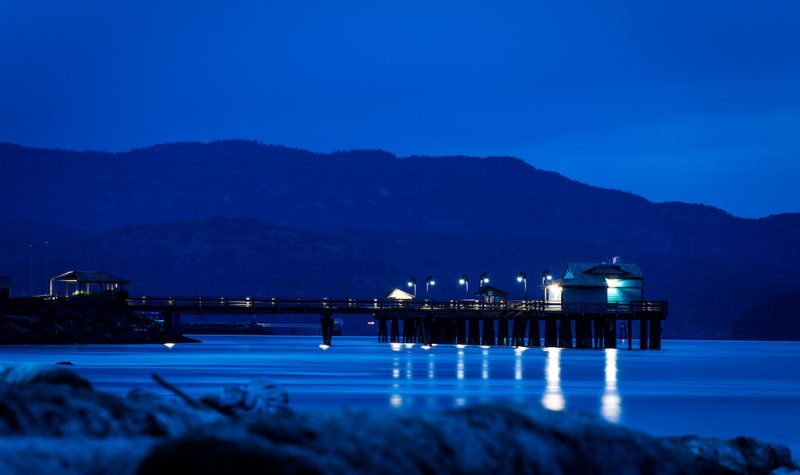 The Campbell River Business Recovery Task Force warns the community that phasing out the Discovery Island fish farms is phasing out one of Campbell River's three economic pillars. Photo of the Campbell River pier at night by Darren Kirby via Flickr (CC BY SA. 2.0 License)