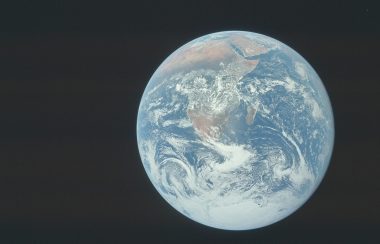A photograph of the planet Earth presenting the African continent. The planet portion of the image occupies the lower right of the image tile, the rest of it is Space.