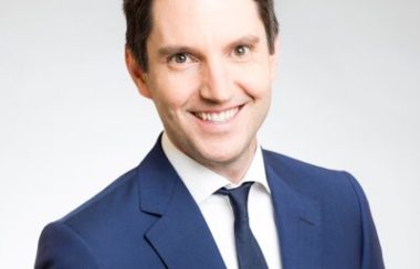 A professional headshot of Pontiac MNA André Fortin, wearing a blue suit, blue tie and white shirt.