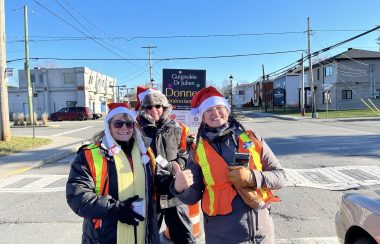 Pictured are volunteers collecting donations.