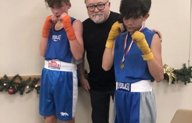 Image shows boxing coach Ken Scullion (middle) Joey Reed wearing a silver medal (Left) and Zander Lavallee wearing a gold medal (right) (photo credits - Ken Scullion)