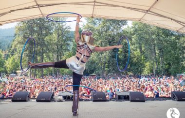 Hoop performer on a stage.