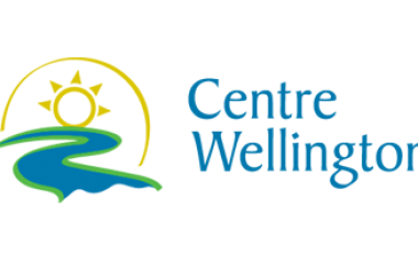 A river with a sun over top makes up the Centre Wellington township logo.