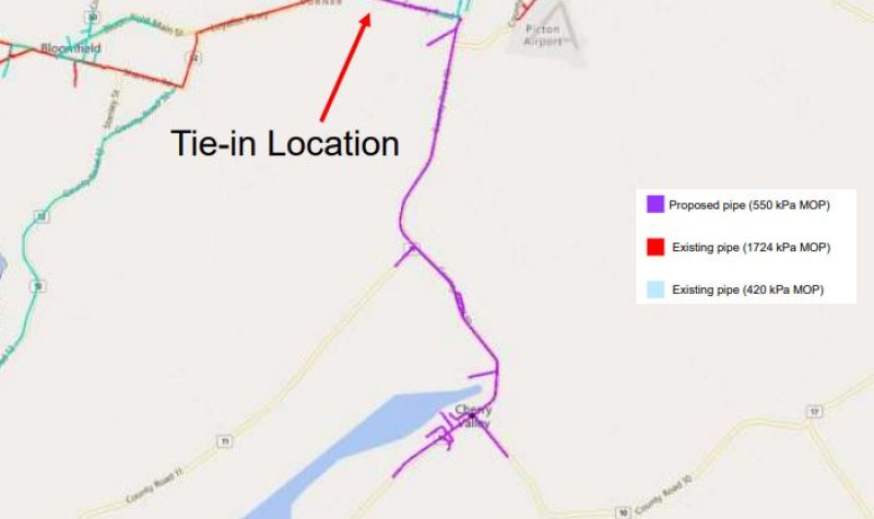 A colour map of the southern reaches of Picton Ontario. Coloured (light blue and red) lines show existing natural gas infrastructure in the area of the map. A long purple coloured line extends southwards from it to represent the proposed gas line expansion.