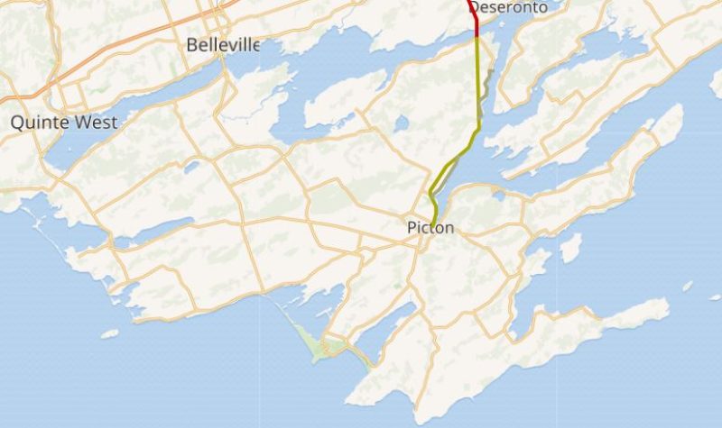 An atlas map of Prince Edward County with a major road highlighted in green and then turns red as it runs north.