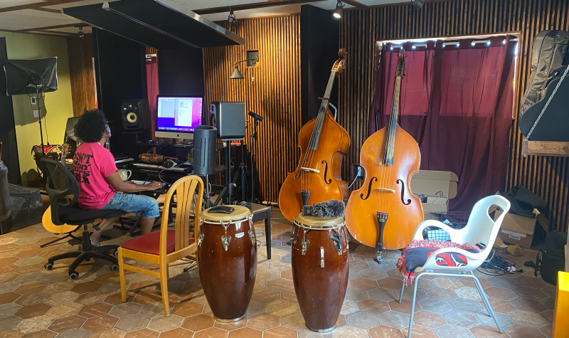 Alex Cuba in his home recording studio in Smithers, BC