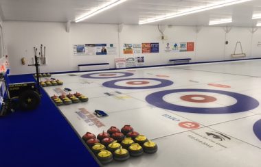 A curling rink ice surface