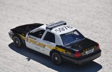 An Abbotsford Police car on Concrete