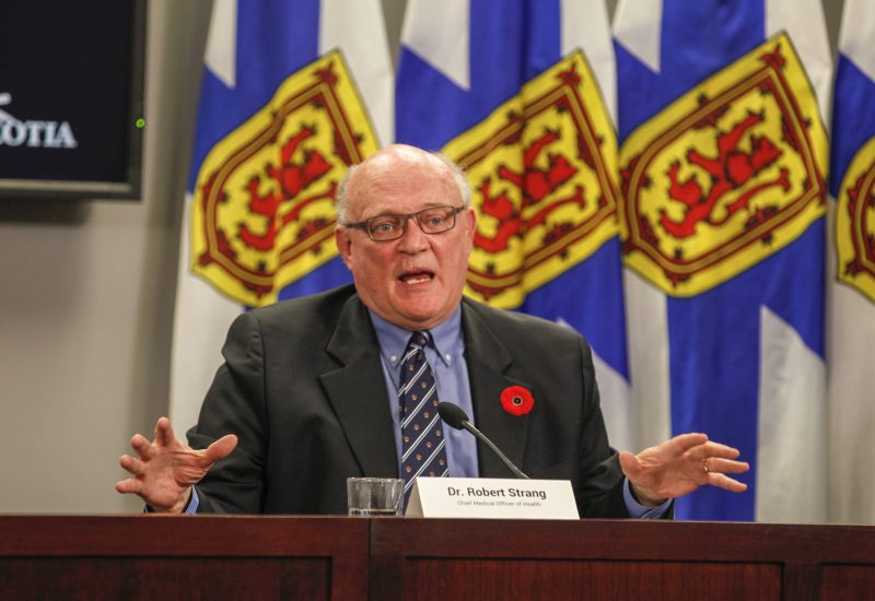 Dr. Robert Strang speaking at a press conference in Nova Scotia.