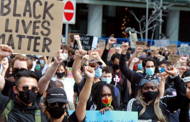 Black Lives Matter supporters rally on June 19, 2020 in downtown Vancouver