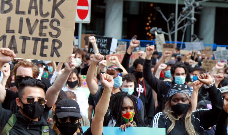 Black Lives Matter supporters rally on June 19, 2020 in downtown Vancouver