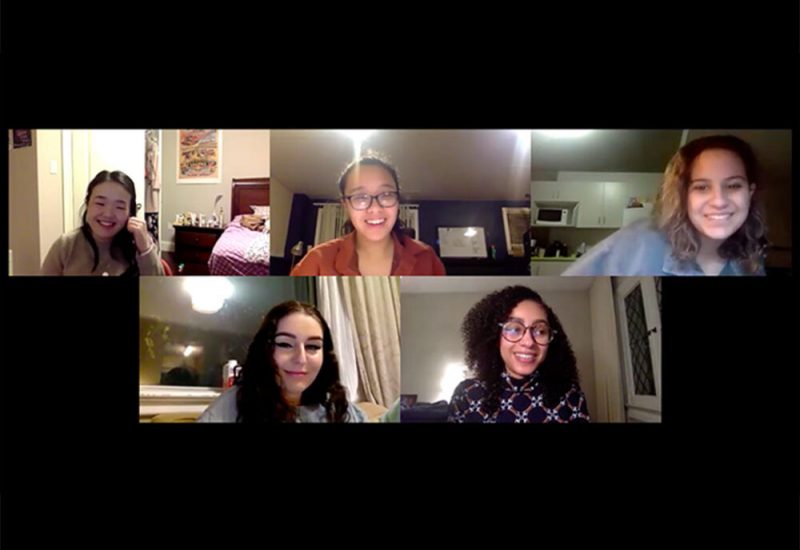 A screen shot of a video call shows five panels. Four panels of four student event organizers and one panel of the journalist all smiling against a black background.