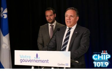 Photo of Francois Legault and Mathieu Lacombe during press conference in Chelsea, QC.