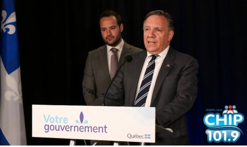 Photo of Francois Legault and Mathieu Lacombe during press conference in Chelsea, QC.