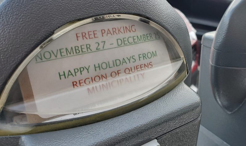 Parking meter displays a free parking sign