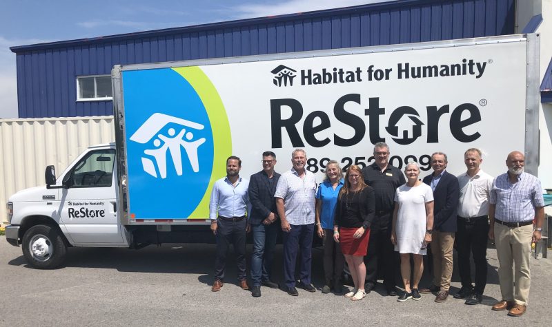 Showing new Habitat truck