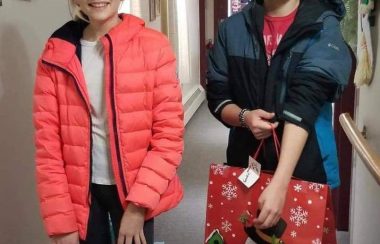 Hunter and Kassidy Lowe deliver Santa for Seniors gifts last Christmas