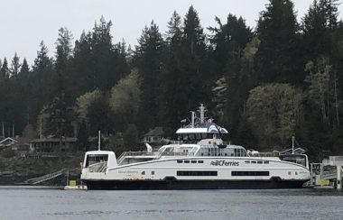 A new vehicle and passenger ferry is docked at a coastal BC island.