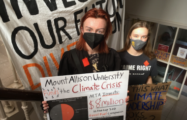 Divest MTA members Mikko McGregor Corson and Islay Fraser on duty at their occupation of Centennial Hall on March 1, 2023. Photo: Erica Butler