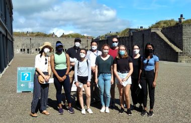 Dr. Marignani and her team standing outside on a sunny day.