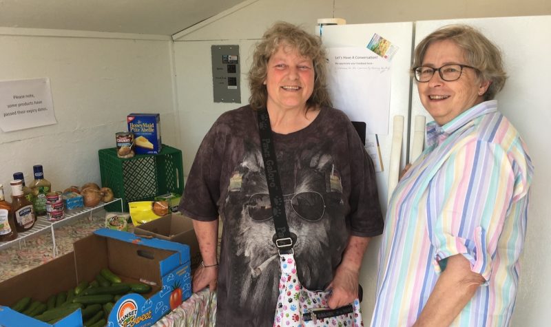 Sackville Food Bank vice-president Tammy Faye and president Heather Patterson stand inside the new Community Sharing Cupboard on Lorne Street, behind the Ice Cream Coop. Photo: Erica Butler