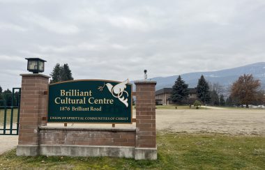 Sign saying Brilliant Cultural Centre. Trees in the background.