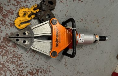 A photo of a hydraulic rescue tool, commonly known as the jaws of life.