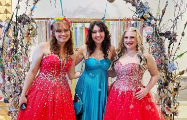 Bethany Zimmer (left) poses with members of UFV's Pride Collective at their Queer Prom event.