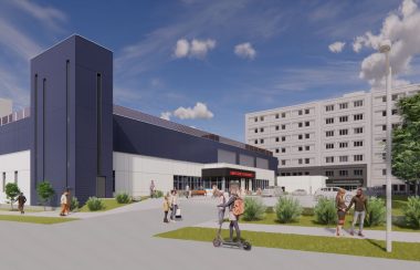 Rendered photo of what the new emergency department at the IWK will look like. It is a picture of a modern looking building with people.