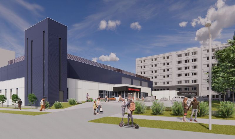 Rendered photo of what the new emergency department at the IWK will look like. It is a picture of a modern looking building with people.
